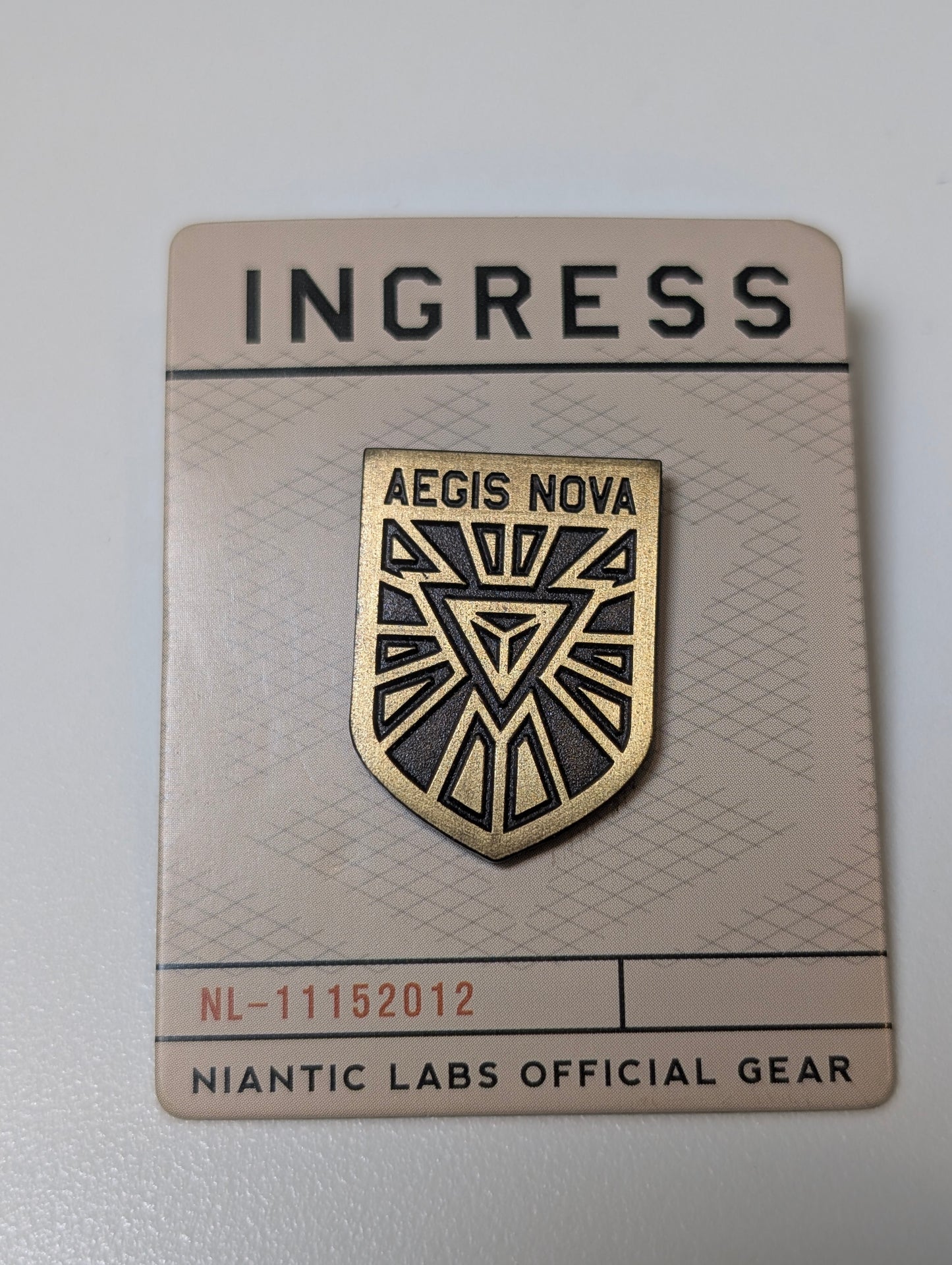 Gold Aegis Nova Pin